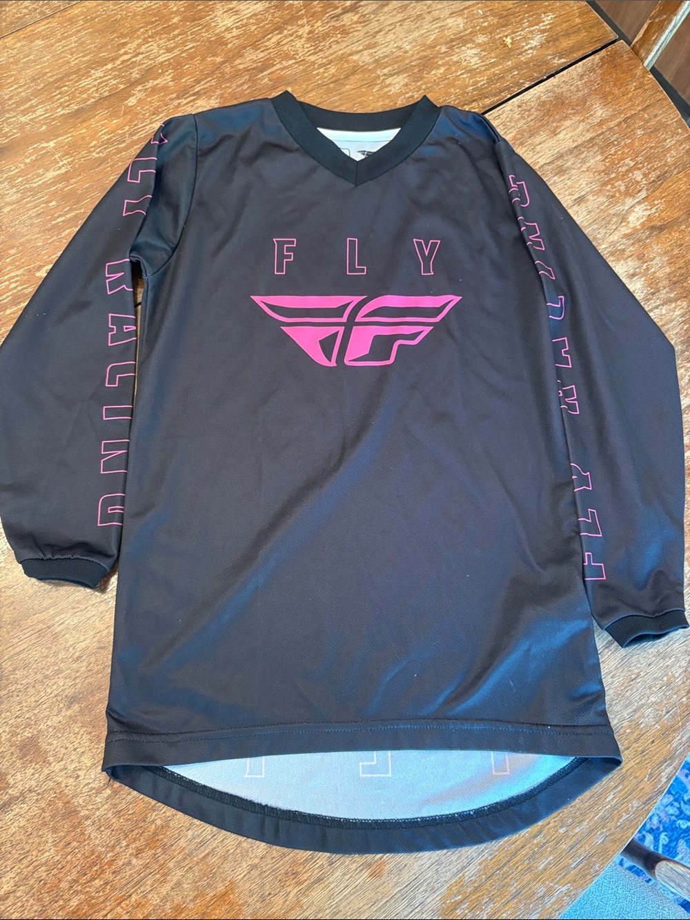 FLY Youth Long-Sleeve Jersey in Black with Pink Logo